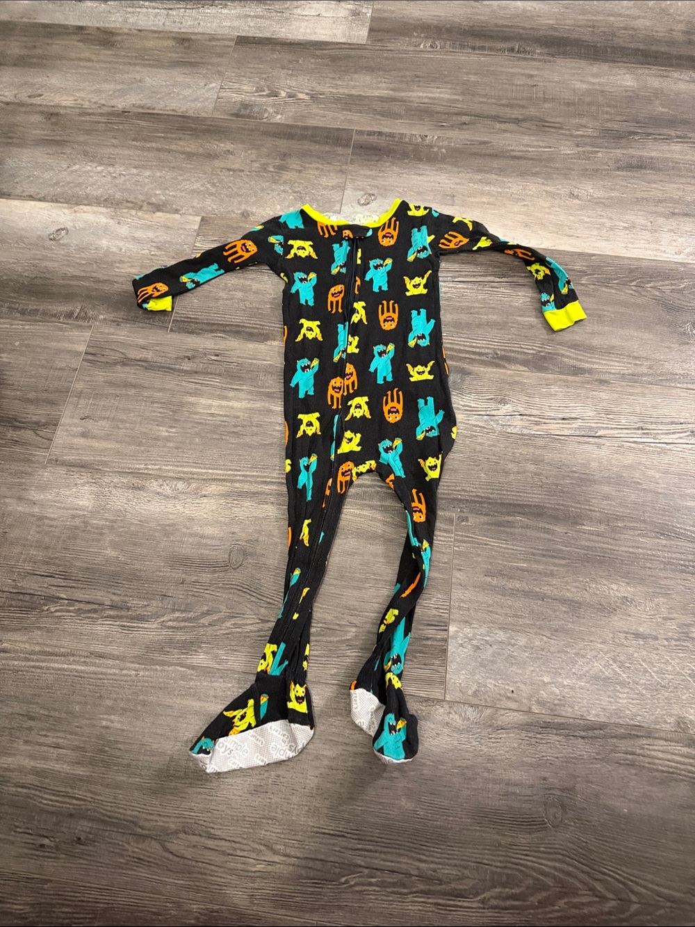 Carters Kids Black Footed One-Piece Pajama with Blue and Yellow Monster Print